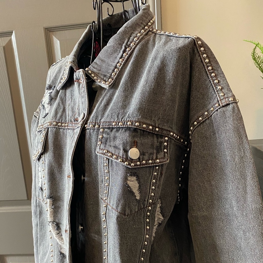 Glitzy Girl Boutique black denim jacket with embellishments. Size 1x.